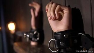 Blonde marionette in metal device restrain bondage gets spanked then caned and shocked with electric fly swatter